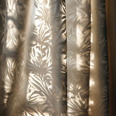 Warm sunbeam casts a natural leafy silhouette on an elegant curtain in a peaceful room