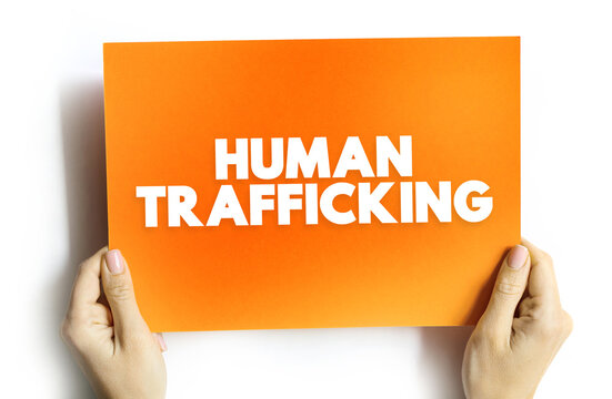 Human Trafficking is the trade of humans for the purpose of forced labour, text concept on card for presentations and reports