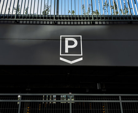 Parking place sign, symbol in modern city