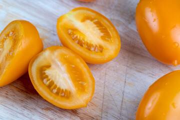 oval sweet yellow tomato, close up