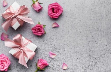 Valentine's Day card. Pink roses and gift boxes