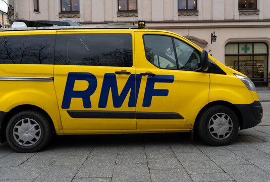 RMF FM radio station broadcasting car. Polish commercial radio network station yellow vehicle with logo sign on November 23, 2023 in Krakow, Poland.