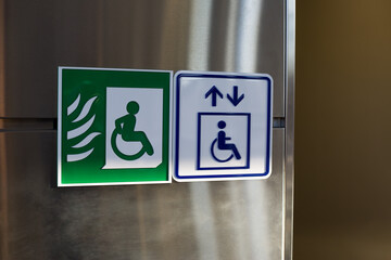 Wheelchair and fireproof elevator sign for people with disabilities. Symbol to help people evacuate...