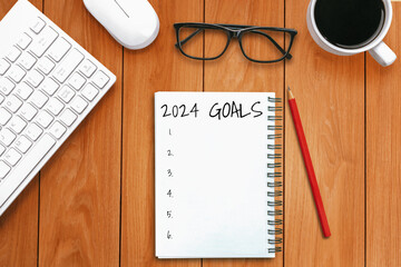 2024 Happy New Year Resolution Goal List and Plans Setting - Business office desk with notebook...