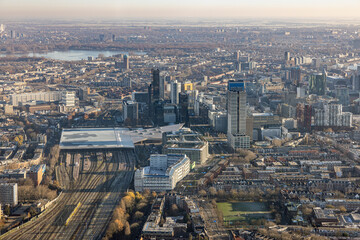 Aerial view city Rotterdam with residential area and railway station
