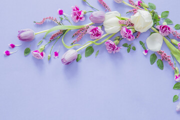 frame of beautiful flowers on purple background