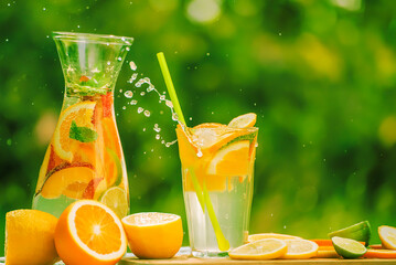 summer refreshing drink made from fruit. Lemonade in the garden.