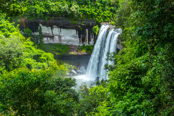 Obraz premium Huay Luang waterfall or Namtok Bak Teo, one of the iconic natural landmark of tourist in Phu Chong Na Yoi National Park, Ubonratchathani, Thailand
