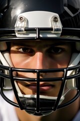 Close-up of a rugby player seen through the helmet