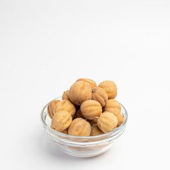 Sun Dried Lime in a glass dish on a white background
