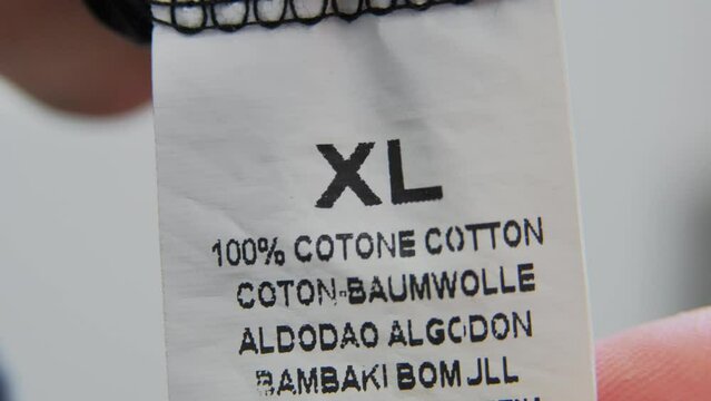 Clothing washing instructions label macro close up stock footage
