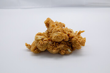 Set of fried breaded chicken fillets isolated on a white background
