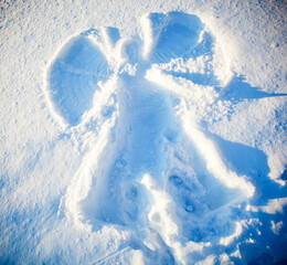 snow angel shape in fresh snow