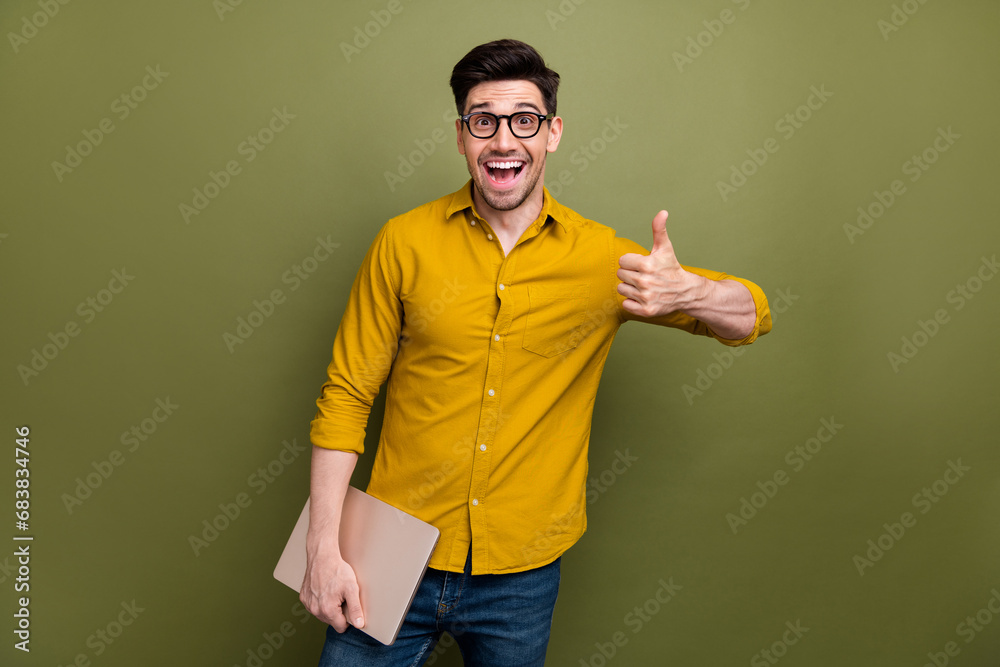 Sticker photo of excited cheerful positive man wear yellow stylish clothes thumb up cool offer isolated on k