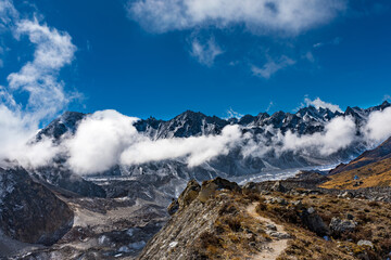 Fototapeta na wymiar Beautiful Himalayan Landscape with Snow capped Mountains in Kanchenjunga Base Camp Trekking in Nepal