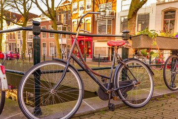Fototapeta na wymiar Bicycles in a canal in Gouda, The Netherlands
