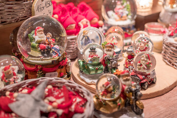 Fototapeta na wymiar Snow Globes and Souvenir in Christmas Market, London, United Kingdom