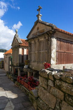Fishing village of Combarro with the typical horreos (fish drying sheds). Galicia, Spain.