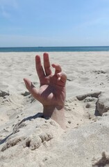 hands on the beach