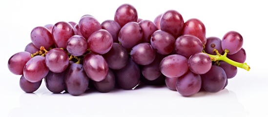 Fototapeta premium On an isolated white background, a perfectly captured image showcases a cluster of juicy grapes, symbolizing health and nutrition with their sweet and nutritious properties rich in Vitamin C, making