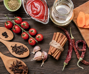 everything on wood table for the preparation of acute Italian sauce