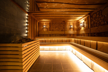 Spa room with hot stones and bench. Alternative therapy and therapeutic inhalations in the sauna.