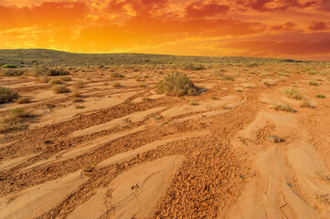 Witness a breathtaking sunset over the red Boguty Mountains. Enjoy a kaleidoscope of vibrant desert...