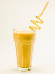 glass of passion fruit on neutral background