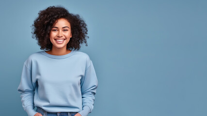 Afro american woman wearing blue sweatshirt isolated on pastel - Powered by Adobe