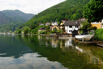 Fototapeta na wymiar Summer landscape at Traunsee lake, landscape photo of lake and mountains near Gmunden, Austria, Europe 