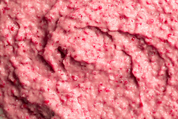 Berry yoghurt ice cream. Smoothies from fresh fruits and berries. Ice cream texture. Delicious sweet dessert close-up as a background.