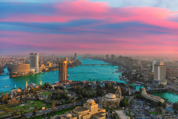 Exclusive aerial sunset panorama of central Cairo, the Nile and the bridges, Egypt