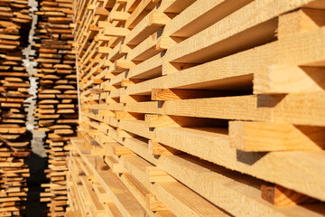 Stacked boards on a sawmill. Production of lumber