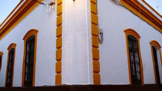 Traditional whitewashed Andalusian architecture at night in Ayamonte, Huelva, Andalucia, Spain, a picturesque blend of charm and history