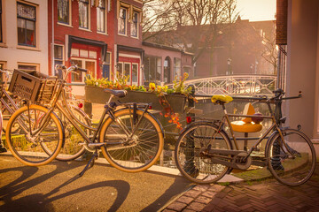 Fototapeta na wymiar Bicycles in a canal in Gouda, The Netherlands