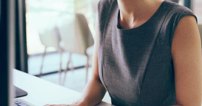 Woman, typing and lawyer on computer in office with report, review or communication with client. Writing, email and legal employee with business advice on company, law or paralegal in workplace