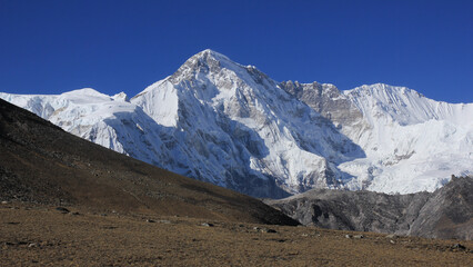Snow covered Cho Oyu, high mountain on the border between Nepal and China.