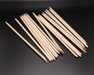 Magnet for manicure and wooden sticks for manicure and cuticles