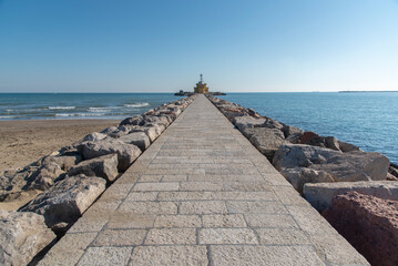 Fototapeta na wymiar Punta Sabbioni's Lighthouse, Punta Sabbioni, Venice, Adria