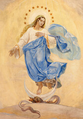 VICENZA, ITALY - NOVEMBER 7, 2023: The fresco of Immaculate Conception on the ceiling of church Chiesa di Santa Lucia by Rocco Pittaco (1862).