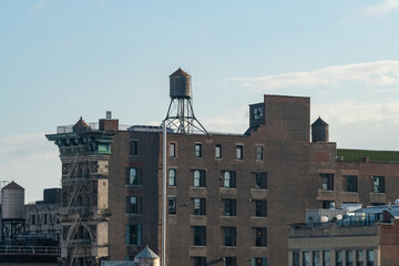 Fototapeta premium Rooftop view of water towers in the West Village neighborhood of Manhattan