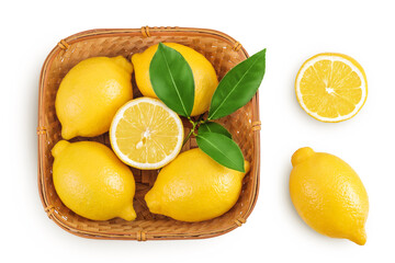 Ripe lemons in wicker basket isolated on white background. Top view. Flat lay.