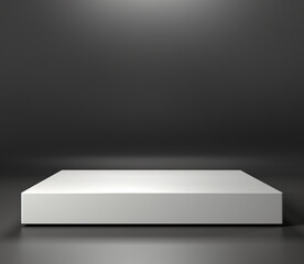 a small square white pedestal for product presentation and advertising in front of a gray background
