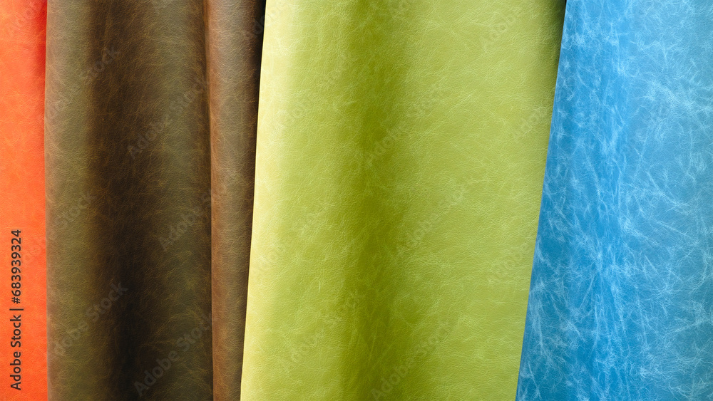 Poster mix colorful hanging vertical stripe leather on the rack. texture of multicolored leather close up.