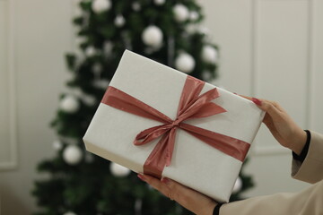 person holding a gift