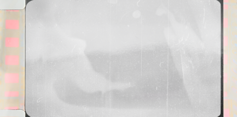 scan of blank 16mm film frame with black border and smear marks, mock up, blend in your photo via blend mode.