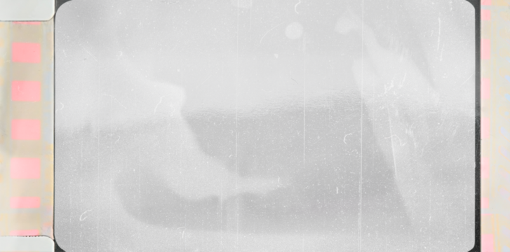 scan of blank 16mm film frame with black border and smear marks, mock up, blend in your photo via blend mode.