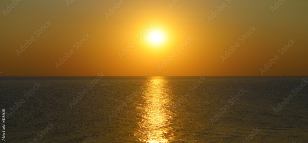 Wall mural sunset with sun path on surface of sea. - Wall murals