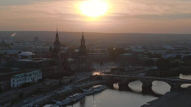 Great aerial top view flight drone. Sunset town Dresden Cathedral Bridge River