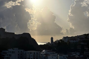 Dramatic sunset over old town in Montenegro.